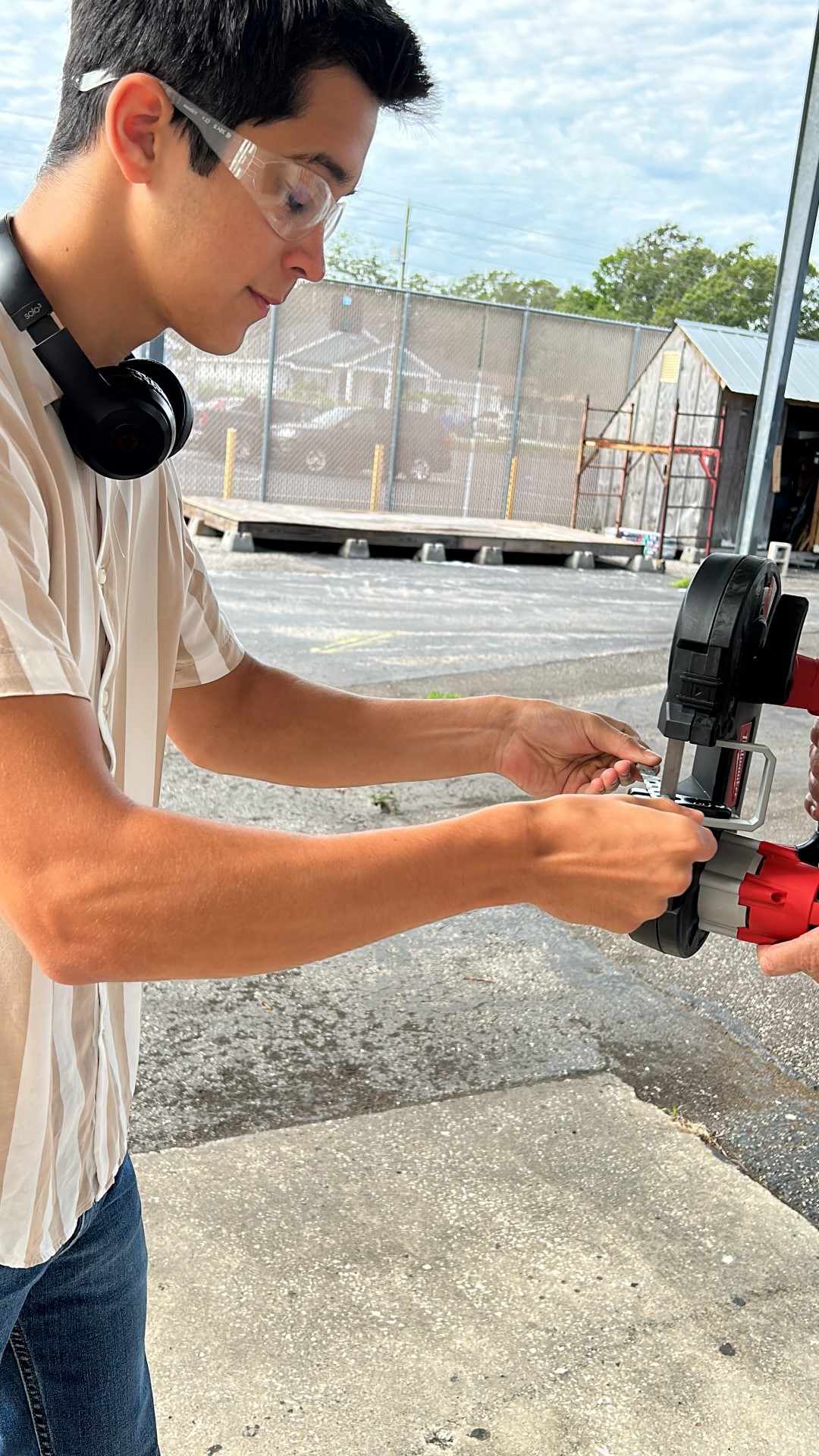 A person using a machineDescription automatically generated